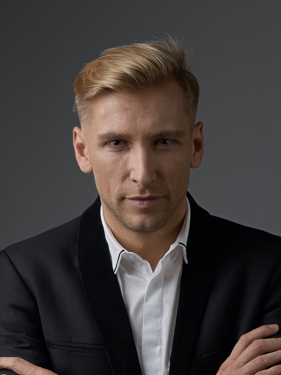 Close-up businessman portrait with hands crossed